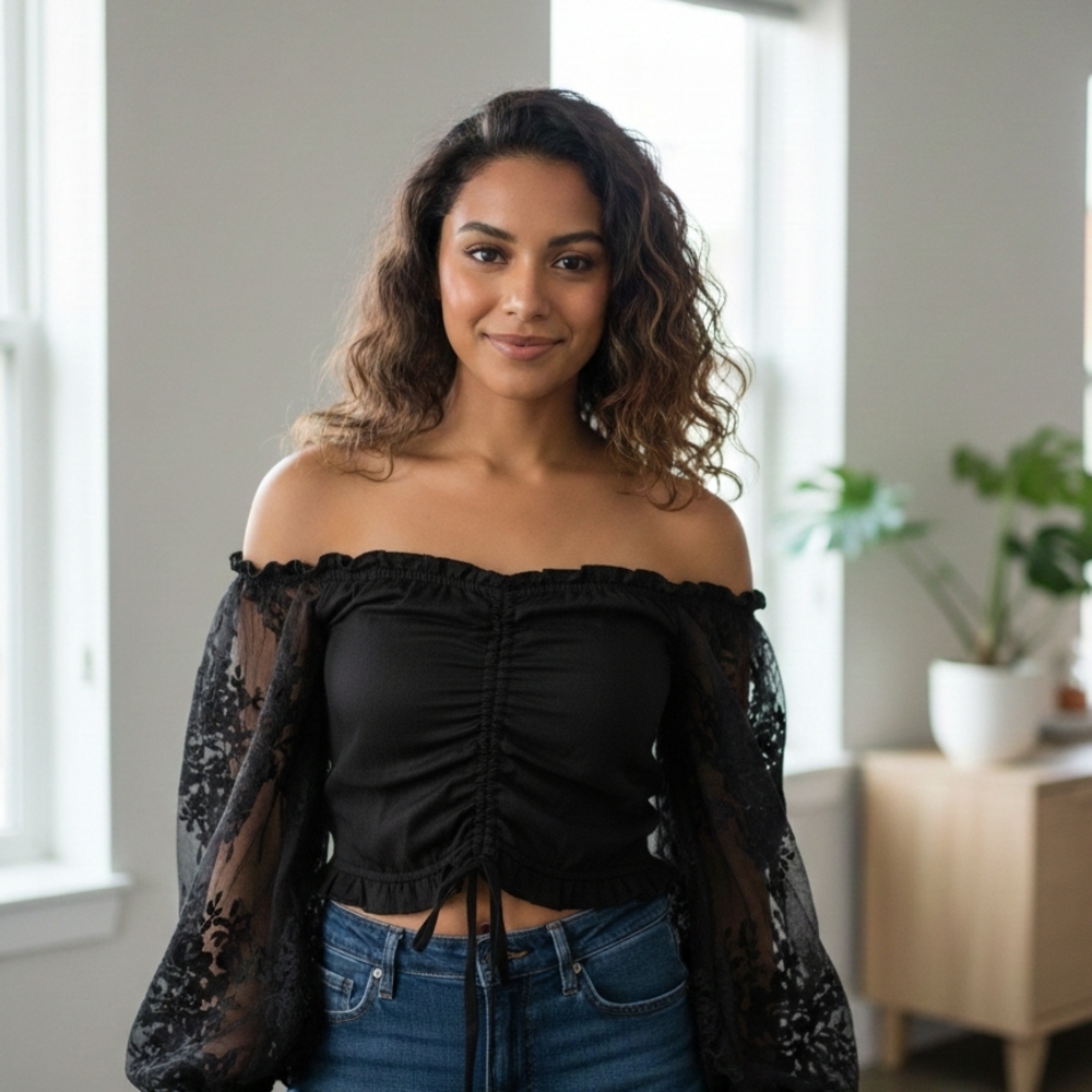 Elegant Black Off-Shoulder Blouse with Sheer Sleeves